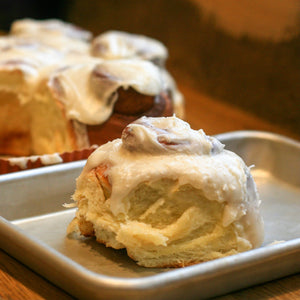 
                
                    Load image into Gallery viewer, Frosted Cinnamon Bun (single portion)
                
            